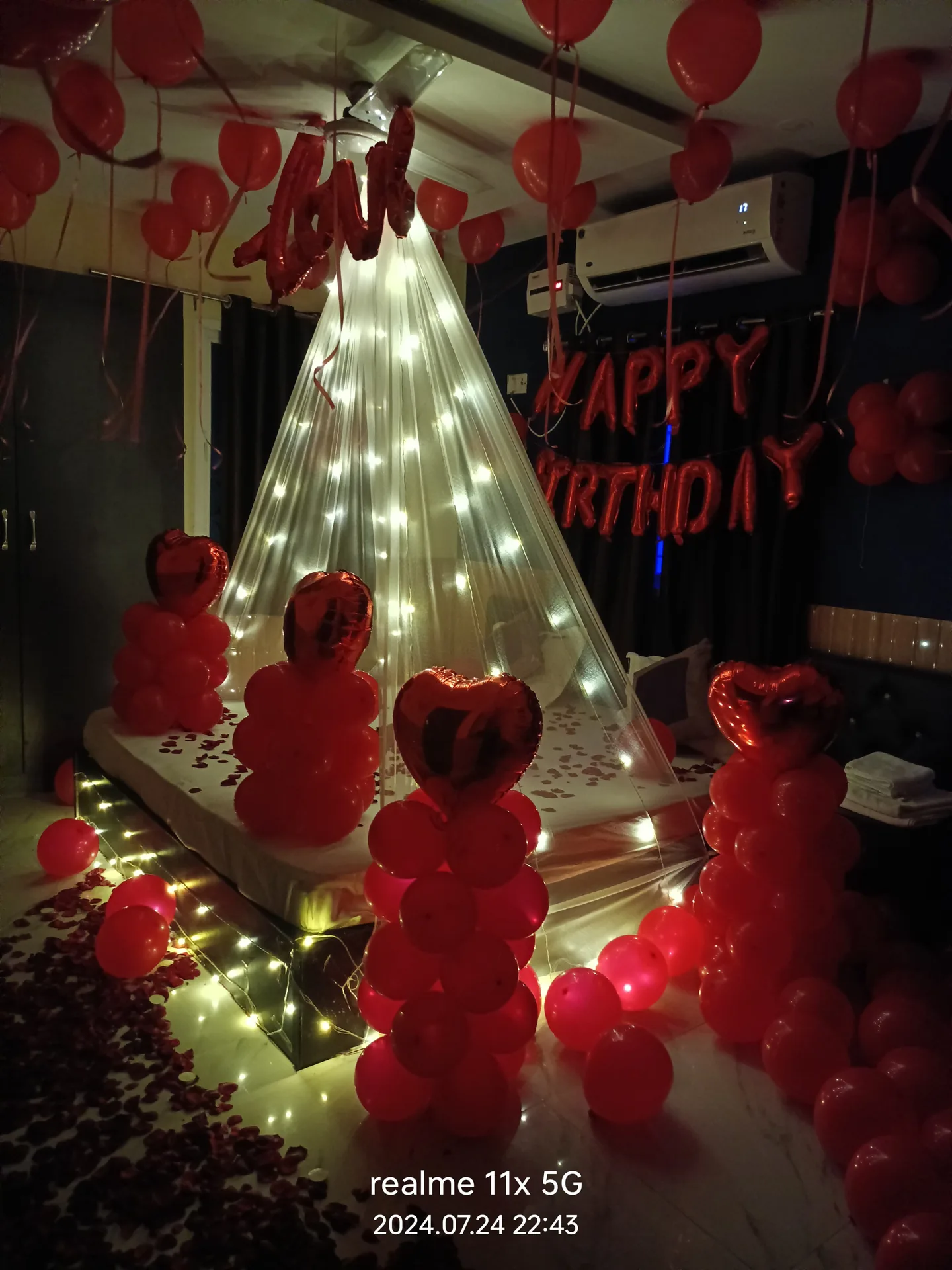 Red balloons canopy birthday room decoration