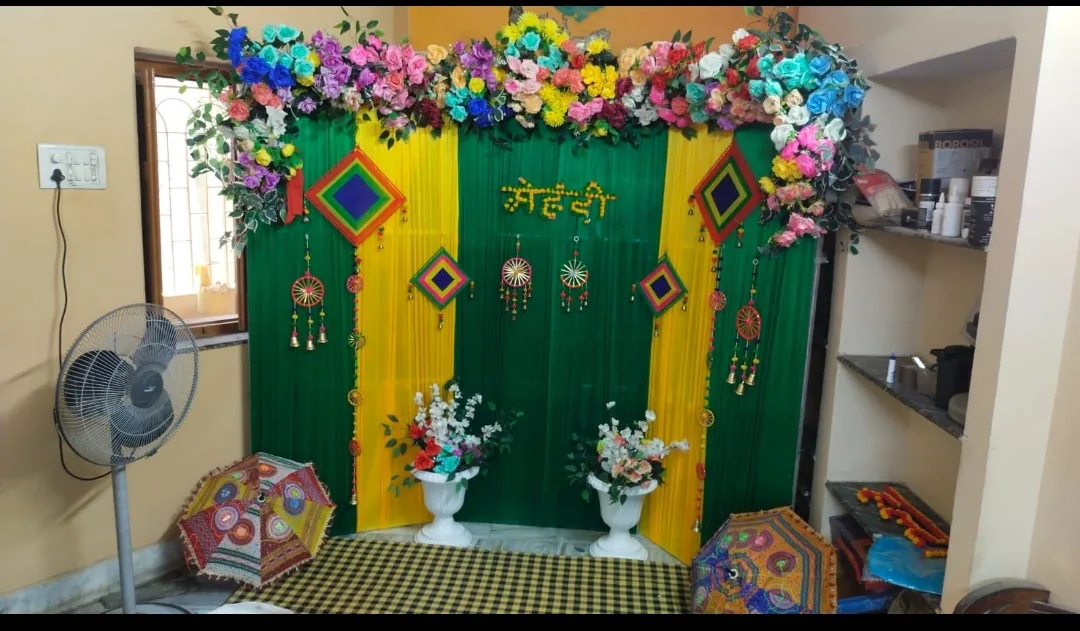 Green and yellow flower mehendi backdrop decoration