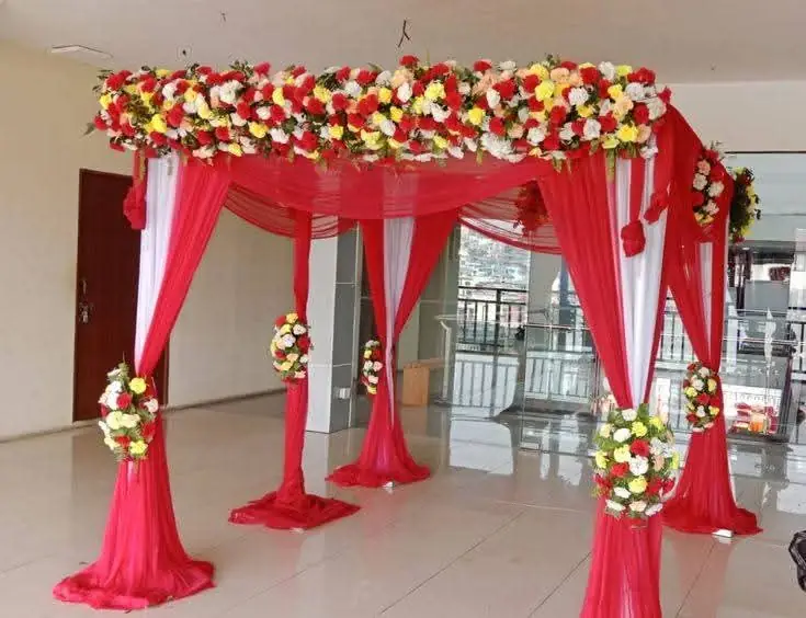 Red fabric and flower wedding mandap decoration in Patna